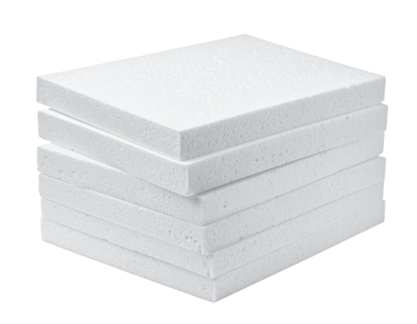 Stack of white foam boards arranged neatly in a pile.