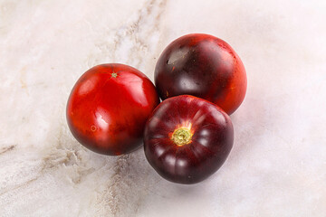 Black ripe juicy organic tomato