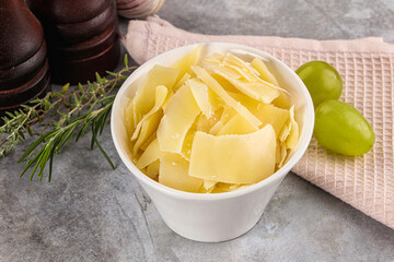 Parmesan cheese slices in the bowl