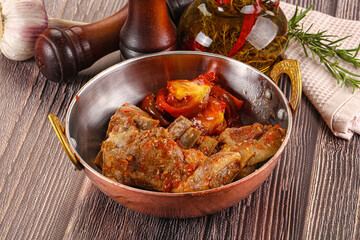 Baked lamb ribs with vegetables