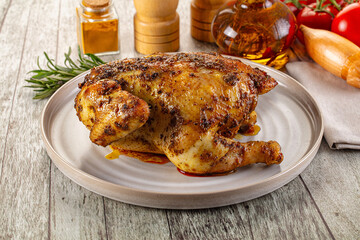Baked in oven whole chicken with spices