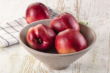 Ripe sweet juicy nectarines heap