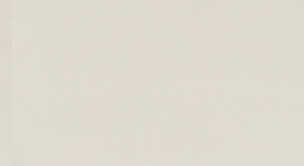 A simple image showing a plain light beige background with subtle variations in tone and texture