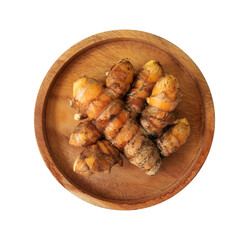 turmeric in a wooden plate with a transparent background. taken from a high angle