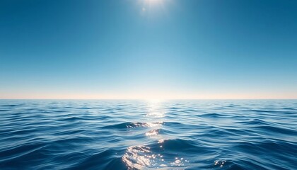 Obraz premium Vast expanse of blue ocean, sun glinting on waves, altitude, viewpoint