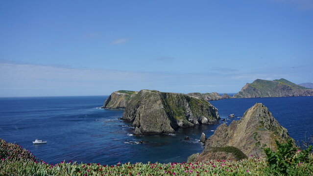 View of Anacapa Islands projecting out of blue pacific ocean off the coast of California