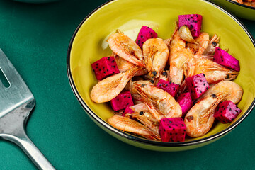 Prawns shrimps roasted with dragon fruit.