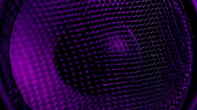 Detailed close-up of purple speaker grill texture, representing audio technology, suitable for music equipment reviews or sound system demonstrations