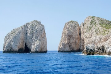 Rocky outcrops in a vast blue sea