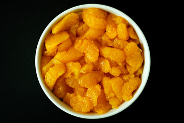 Fototapeta premium A Bowl of Healthy Mandarin Orange Segments Dessert