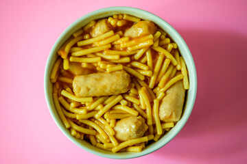 A Bowl of Classic Spaghetti in Tomato Sauce With Pork Sausages