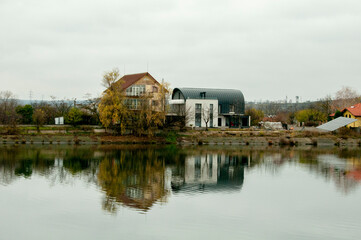 Obraz premium house on the river