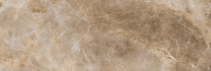 A close up shot of a beige marble surface with intricate veining and subtle color variations visible throughout