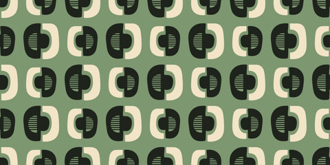 Retro Green Geometric Pattern. repeating geometric pattern in shades of green and white. The pattern consists of stylized shapes resembling rounded squares.