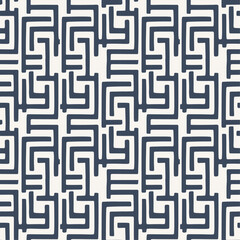 Abstract Navy and White Pattern. The pattern consists of navy blue geometric shapes resembling stylized mazes or interconnected pathways against a white background.