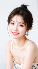 美白美肌の若い日本人女性の美容・ビューティーポートレート（白背景、背景なし、デコルテ）