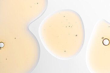 Textured background of cosmetic moisturizing gel or skin serum