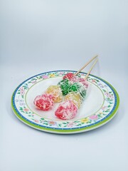 Sweet rice snacks shaped like flowers, ideal for cultural, culinary, or festive promotional content.