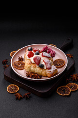 Food for breakfast sweet strawberry croissants with chocolate filling