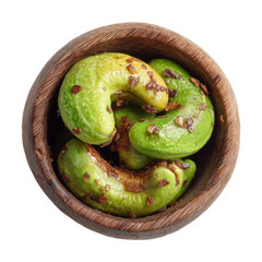 Fototapeta premium Savory green cashews in wooden bowl transparent background close-up view gourmet food
