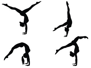 Silhouette of Female Gymnasts Performing Handstands and Acrobatics