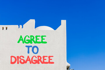 Agree to disagree symbol. Concept words Agree to disagree on beautiful white wall. Beautiful white...