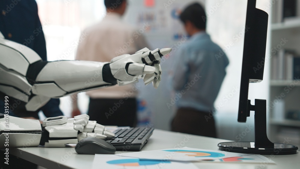 Poster a futuristic robotic hand engages with a computer keyboard, illustrating the integration of technolo