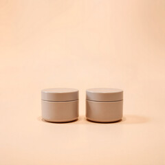 Minimal Cosmetic Cream Jars on Beige Background – Skincare Product Packaging Display