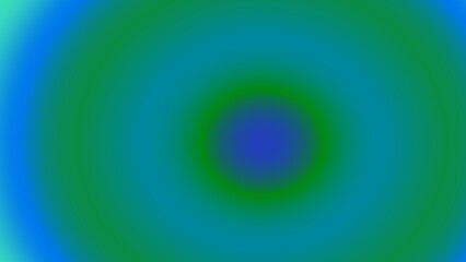 Concentric circles of blurred teal, green, and blue hues create a hypnotic gradient effect