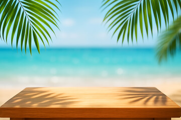Obraz premium Beach background with wooden table and palm leaves for product display