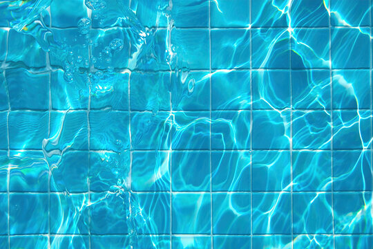 top view of the bottom of a pool with water, transparent water in a pool