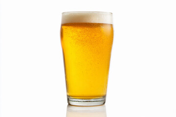 Golden craft beer in a clear glass with a frothy head served on a white background for a refreshing experience