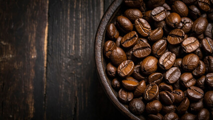 Fototapeta premium Roasted Coffee Beans on Rustic Wooden Background in Warm Lighting 