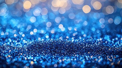 Sparkling blue glitter texture with bokeh lights, ideal for festive backgrounds or celebratory designs