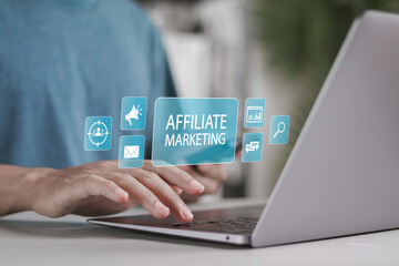 Affiliate marketing concept. New business, Marketing strategies to advertise products and services. Person use laptop with affiliate marketing icons on virtual screen.