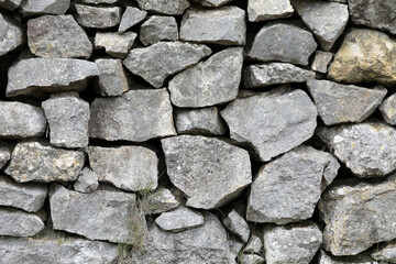 Natural stone wall made of large stones