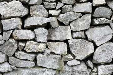 Natural stone wall made of large stones