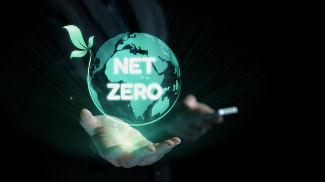 Hands cradle a glowing Earth with a green leaf, representing the concept of net zero emissions and a commitment to sustainability for a better future. Qubit