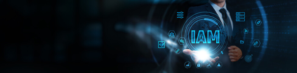 Identity and Access Management, businessman holding IAM icon, business and enterprise security...