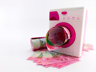 money in a washing machine toy