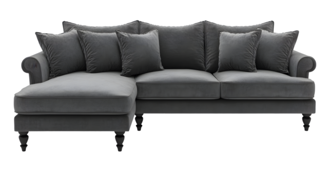 A gray velvet L-shaped sofa with rolled arms and turned legs, featuring multiple plush cushions for comfortable seating