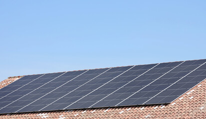 Fototapeta premium Solar panel installed on a roof