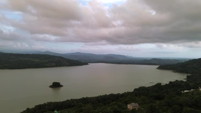 Afternoon View of a Calm Reservoir bili bili dam Lake with Soft Natural Light in sulawesi