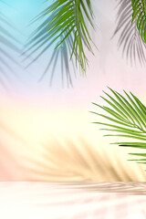 Elegant sunny colorful banner,background with long shadows from palm leaves.Empty beautiful tropical podium and template for your creativity,summer party concept and product display stand.