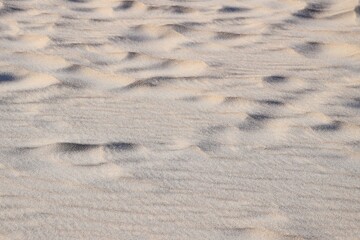 Natural pattern on the sand from the wind. Background.