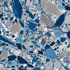 Abstract Mosaic of Blues: A high-angle shot of an elegant, abstract mosaic showcasing a complex arrangement of shapes and shades of blue.