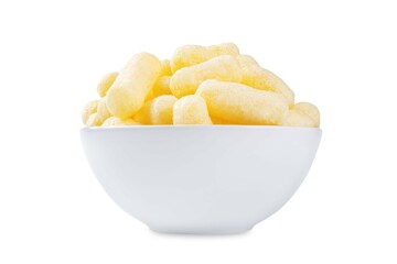 Corn sticks in a white bowl on a white isolated background