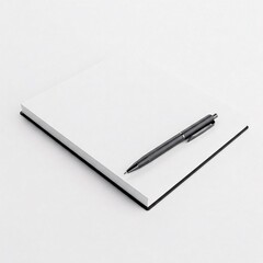 White notebook with pen on white background
