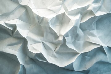 Fototapeta premium Abstract crumpled paper texture with geometric folds for backgrounds and artistic projects.