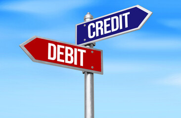 Obraz premium Credit vs Debit written on the signboard in opposite direction, background. Business, credit, money, finance, banking, debt